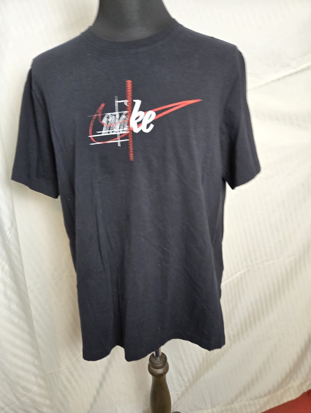 Nike Black Short-Sleeve Graphic Logo Tee with Red Accent